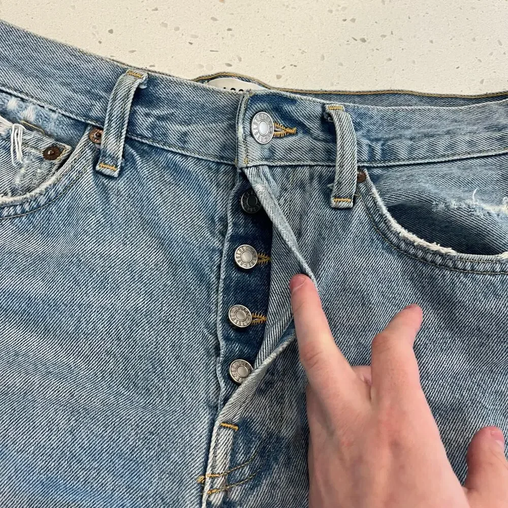 Agolde Parker Long Light Blue Distressed Denim Shorts in Swapmeet 27